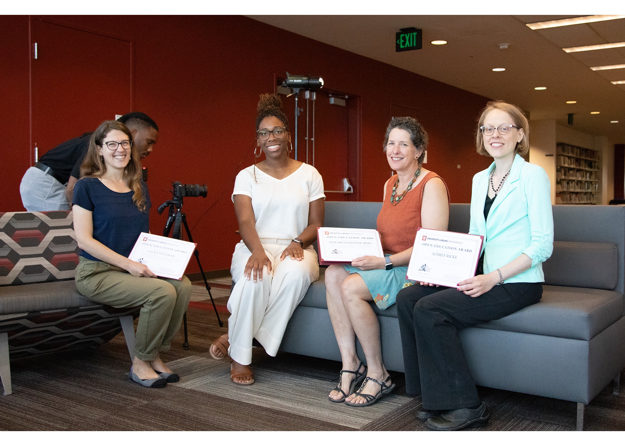 Color photo of four women, three of whom won Indiana University Indianapolis Open Education Award recognition